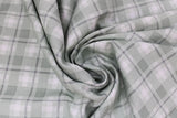 Swirled swatch fabric in Green & White Plaid