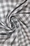 Swirled swatch fabric in Grey & White Plaid