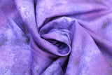 Swirled swatch marbled solid fabric in purple