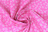 Swirled swatch ditty flowers fabric (pink fabric with tossed dark pink polka dots and small white ditty flower heads)