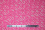 Flat swatch ditty flowers fabric (pink fabric with tossed dark pink polka dots and small white ditty flower heads)