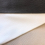 Group swatch faux leather look upholstery fabric in various colour options