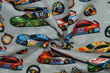 Print "Large Cars" from the Turbo Speed collection, twisted to show drape and texture.