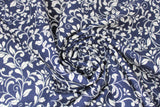 Swirled swatch John Louden fabric (navy blue fabric with white leafy floral swoopy pattern allover)