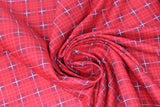 Swirled swatch wild at heart fabric (bright red fabric with dark red and white plaid lines/squares)