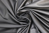 Swirled swatch black fabric (black metallic effect fabric)