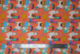Flat swatch orange fabric (orange fabric with busy tossed cacti in various styles and colours, and tossed white llamas with colourful decorative saddles, tossed blue mountains and coloured rainbows, etc.)