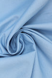 Swirled swatch of cotton solid in light blue