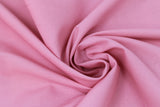Swirled swatch of cotton solid in rose pink