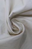 Swirled swatch of cotton solid in antique white