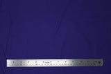 Flat swatch of cotton solid in violet (dark purple)