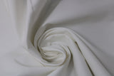 Swirled swatch of cotton solid in bleached white