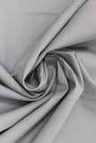 Swirled swatch of cotton solid in dark grey