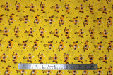 Flat swatch cartoon chicks printed fabric in yellow (yellow fabric with occasional brown polka dots and yellow/brown cartoon baby chickens tossed allover)