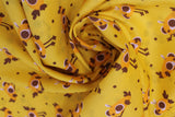 Swirled swatch cartoon chicks printed fabric in yellow (yellow fabric with occasional brown polka dots and yellow/brown cartoon baby chickens tossed allover)