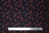 Flat swatch lightning printed fabric in black (black fabric with pink and blue squiggly lightning bolt look print tossed allover)