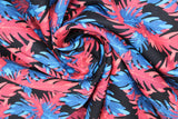 Swirled swatch big leaves printed fabric in black (black fabric with blue and pink leafy pattern allover)
