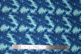 Flat swatch big leaves printed fabric in blue (light blue fabric with medium and dark blue leafy pattern allover)