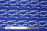 Flat swatch of blue fabric in futuristic (dark blue fabric with white and light blue tossed polka dots and horizontal cloud lines in various blues, grey)
