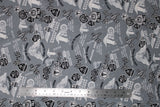 Flat swatch of assorted Friday the 13th pattern on grey (grey fabric with multi emblems tossed in black and white. Crossing checkered flags, 13 badges, "Port Dover Motorcycle Rally" text, wheels, etc.)
