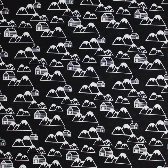 Square swatch of mountain cabins printed fabric in black (black fabric with tossed white cartoon mountains and cabin print repeated)