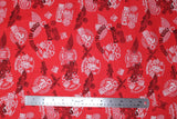 Flat swatch of assorted Canadian custom motorcycles fabric in red (red fabric with tossed logo and text related to Canadian custom motorcycles "Custom" text, etc. in white, black)