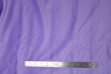 Flat swatch of faux fur fabric in light purple