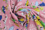 Swirled swatch mae flowers scene (girls with umbrellas) printed fabric in pink