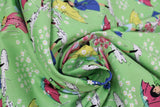 Swirled swatch mae flowers scene (girls with umbrellas) printed fabric in green