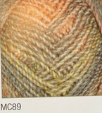Swatch of Marble Chunky yarn in shade MC89 (tan, yellow, orange, beige faded shades with twists)