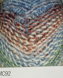 Swatch of Marble Chunky yarn in shade MC92 (white, light to medium blues, green and burgundy shades with twists)