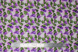 Flat swatch lily fabric (pale pink fabric with white and purple lilies allover with green leaves)