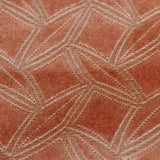 Square swatch of velvet upholstery fabric with abstract squares/diamonds/dots outlines design (pale coral fabric with grey/beige pattern)