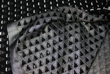 Inside of black mesh with metallic cut outs