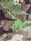 Swatch of two-sided fleece flannel in Dinosaur (camo coloured dinosaurs on grey)