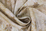 Swirled swatch music sheet fabric (white and cream fabric with subtle sheet music in background and small/large intricate snowflake shapes layered throughout in white, tan, and brown)