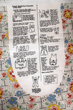 Directions for apron panel (pink/blue flowers on white)