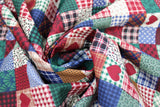 Swirled swatch Patchwork fabric (small squares quilt style printed fabric in various prints and colours including plaids and hearts in red, blue, green, etc.)