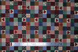 Flat swatch Patchwork fabric (small squares quilt style printed fabric in various prints and colours including plaids and hearts in red, blue, green, etc.)