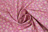 Swirled swatch Pink Daisies fabric (small tossed pink daisy floral heads allover with medium sized white daisy heads with yellow centers)