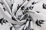 Swirled swatch Pirate Ship fabric (light grey fabric with tossed black ship outlines with skull and cross bone flags)