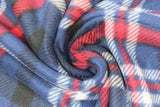 Swirled swatch navy plaid fabric (navy fabric with large diagonal plaid lines in white and red)