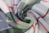 Swirled swatch mint plaid fabric (white and light grey fabric with medium pale green and red plaid lines throughout)