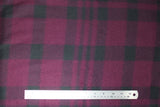 Flat swatch plum plaid fabric (medium grape purple fabric with large faded black/purple plaid lines)