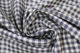 Swirled swatch black and grey plaid fabric (light grey fabric with small diagonal square black plaid/gingham squares)