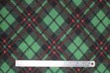 Flat swatch Christmas plaid fabric (medium green fabric with diagonal black and red plaid lines thick medium size)