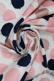 Swirled swatch circles & dots print fabric in blush (pink/black circles on white)