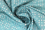 Swirled swatch circles & dots print fabric in Juxtaposey (light blue/white dot design)