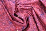 Swirled swatch fabric in city dreams (burgundy/red)