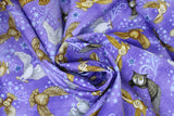 Swirled swatch animal themed printed fabric in Owls (on purple)